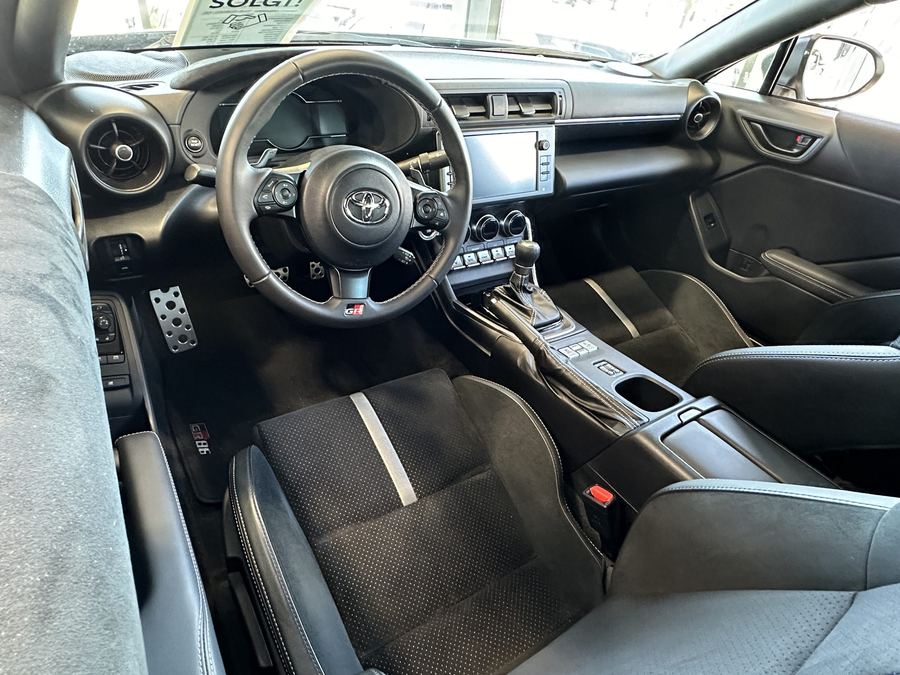 Toyota GR86 cockpit and front seats.