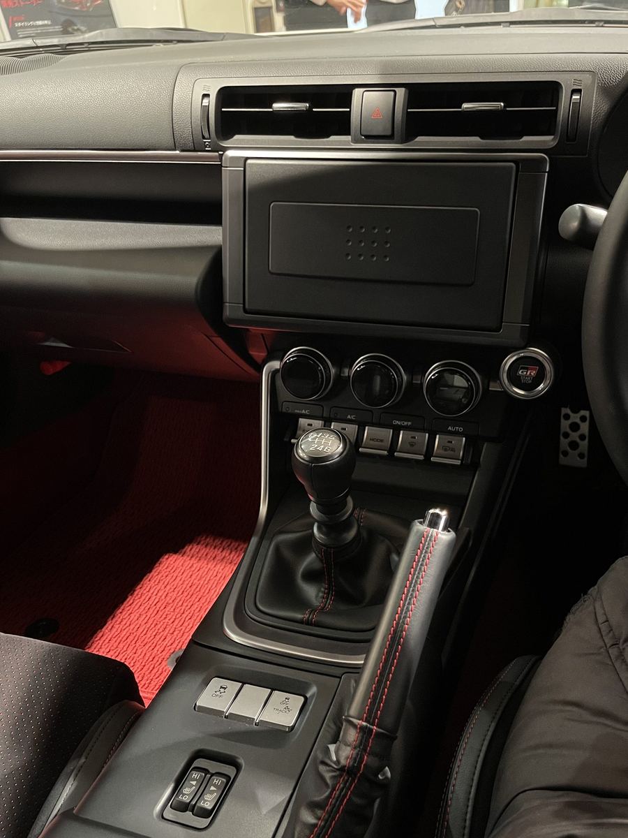 GR86 center console with the touchscreen, climate dials and shifter (Japan-market car).