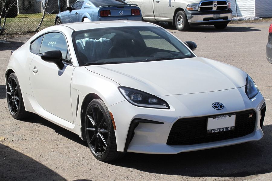 2022 Toyota GR86 in white, front three-quarter view.