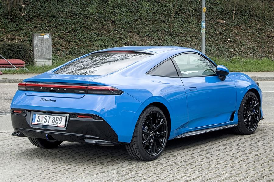 Prelude in blue, rear three-quarter view on the street.