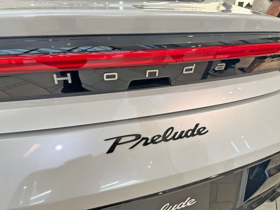 Prelude tail-lamp bar with Honda lettering and the Prelude script badge.