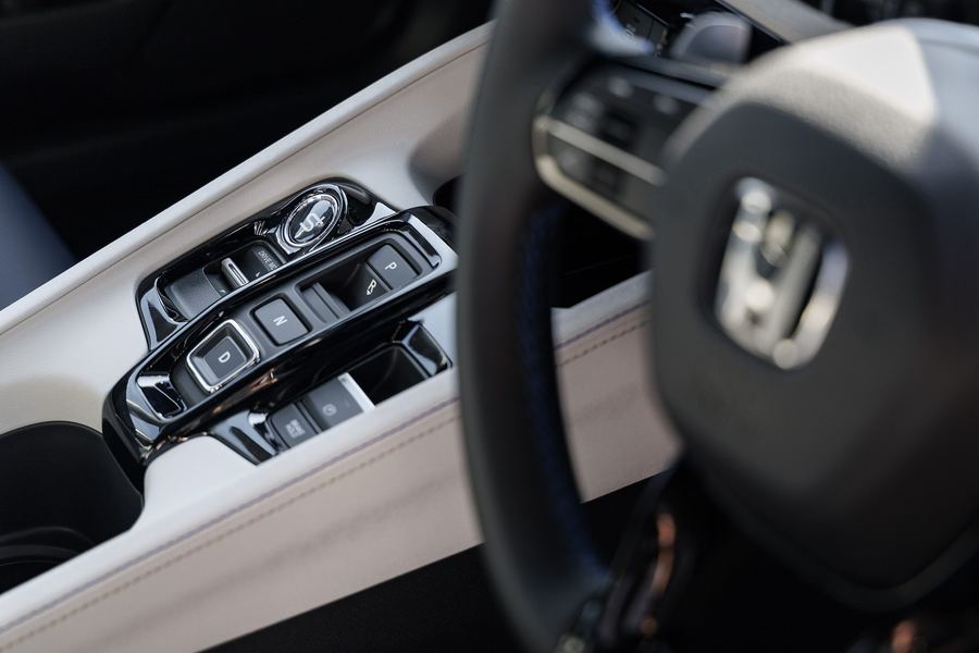 Prelude steering wheel and shifter switchgear up close.
