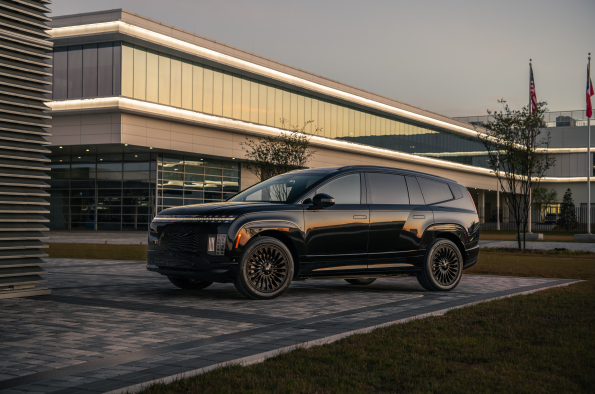 2026 Hyundai Ioniq 9 Calligraphy Black Ink, side profile at dusk.