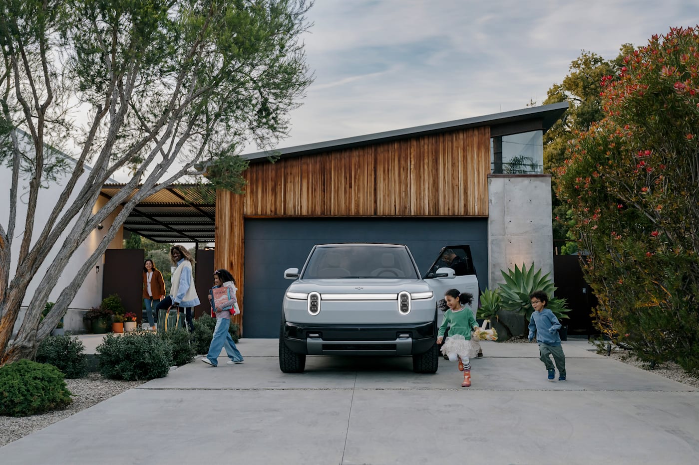 Rivian R2 electric SUV, side profile, official press photograph.