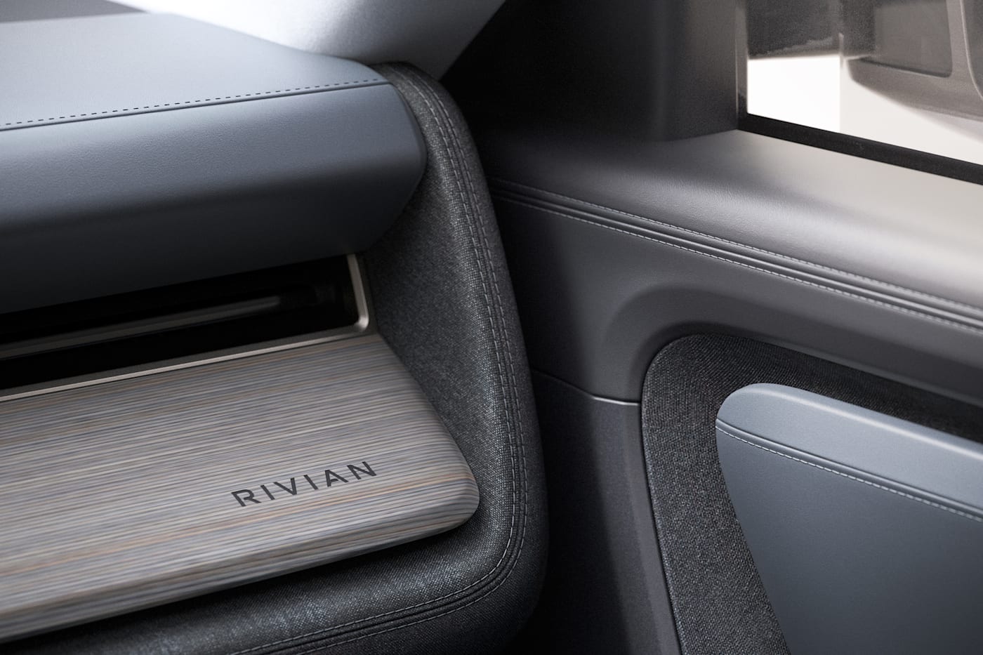 Rivian R2 instrument panel detail, official press photograph.