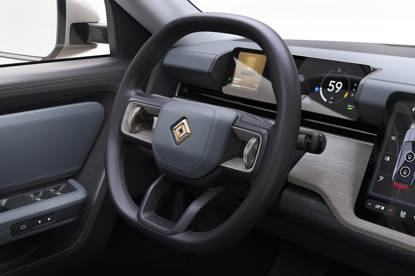 Rivian R2 steering wheel with Haptic Halo touch zones, official press photograph.