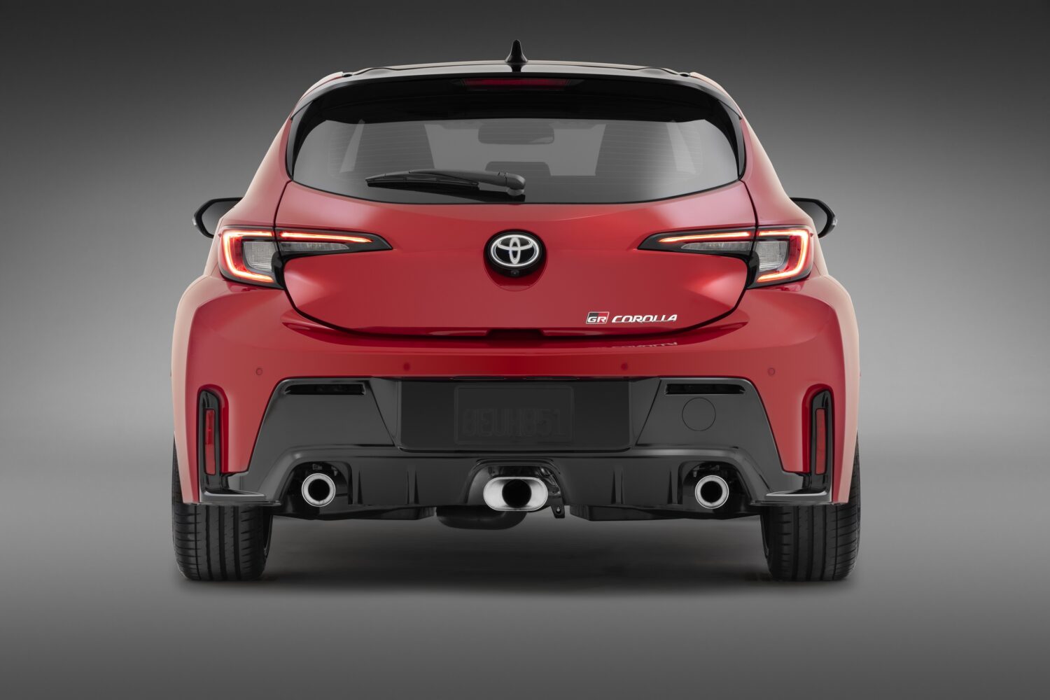 2026 Toyota GR Corolla, studio rear three-quarter view.