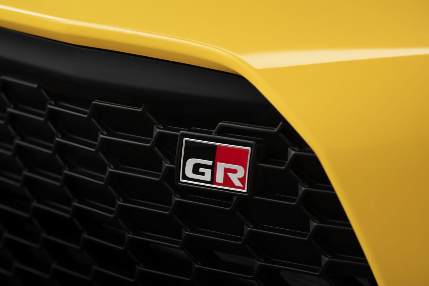 2026 Toyota GR86 Yuzu Edition interior, black Ultrasuede sport seats with yellow stitching.