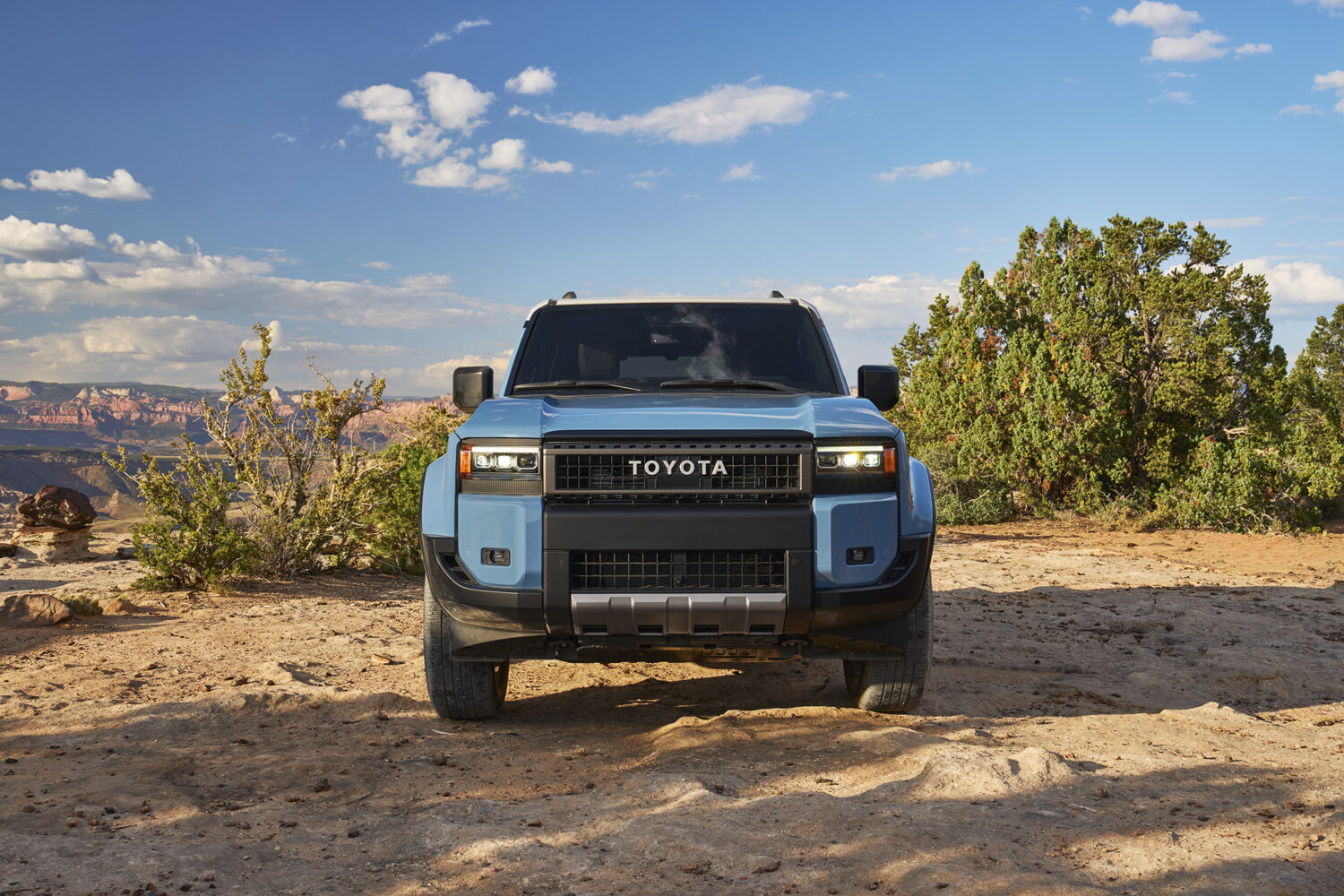 2026 Toyota Land Cruiser, front three-quarter view off-road.