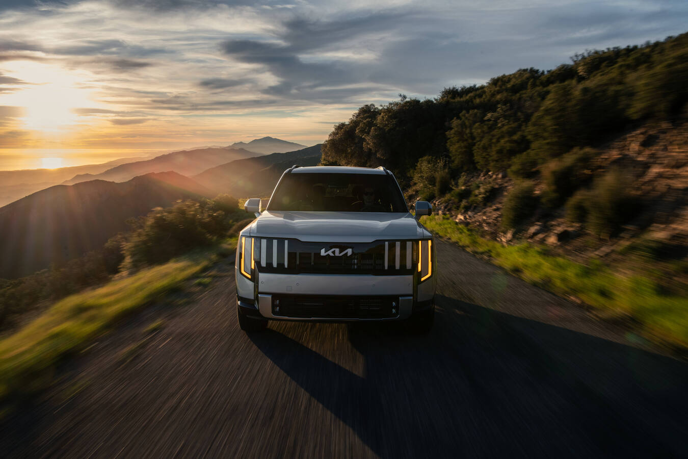 2027 Kia Telluride X-Pro driving shot, official Kia press photography, 1 of 8.