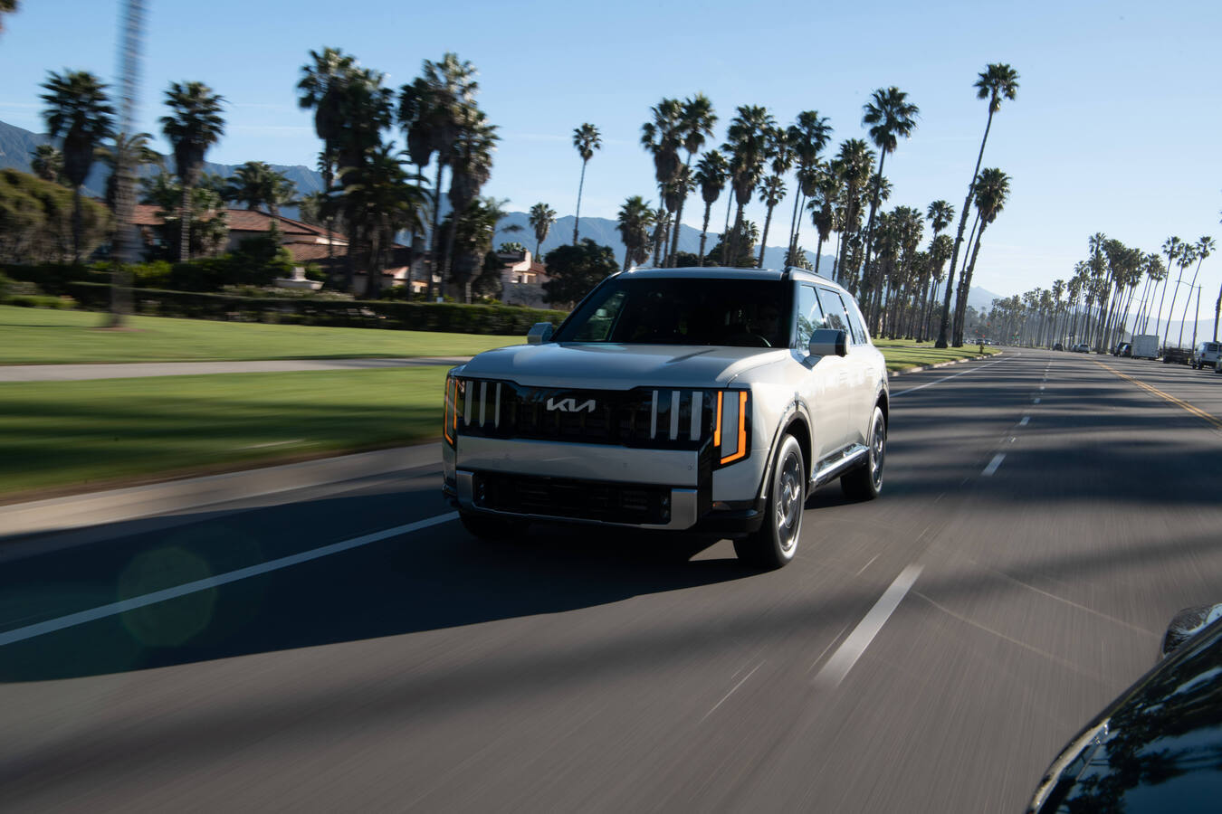 2027 Kia Telluride driving shot, official Kia press photography, 4 of 8.