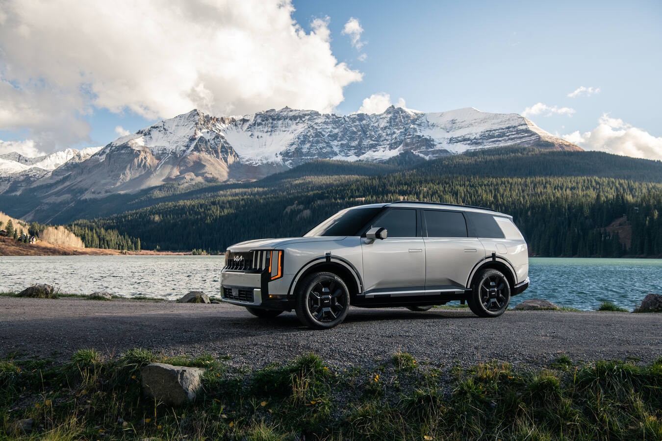 2027 Kia Telluride Hybrid SXP by an alpine lake, official Kia press photography, static shot 4.