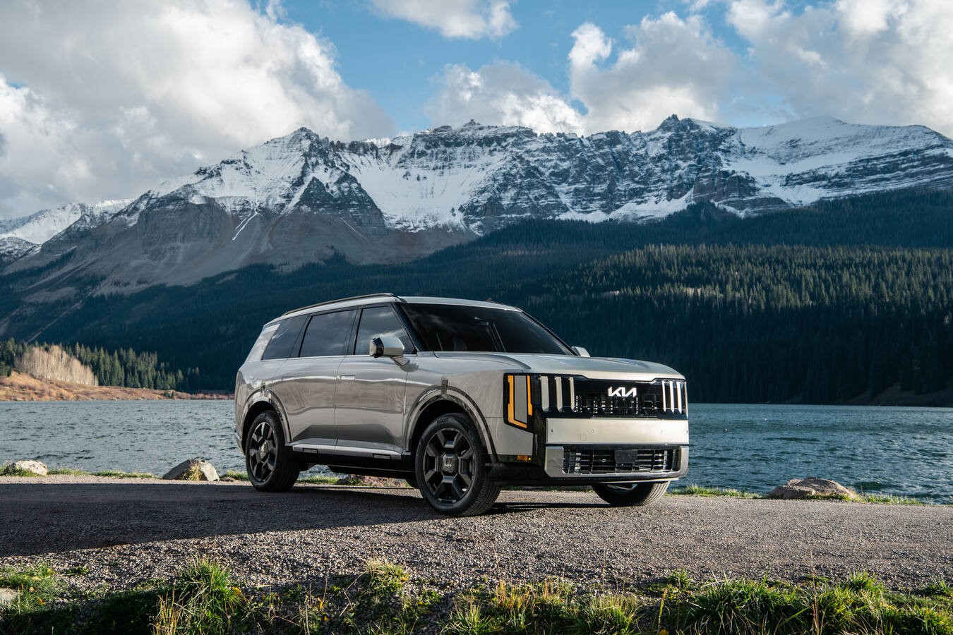 2027 Kia Telluride Hybrid SXP by an alpine lake, official Kia press photography, static shot 5.