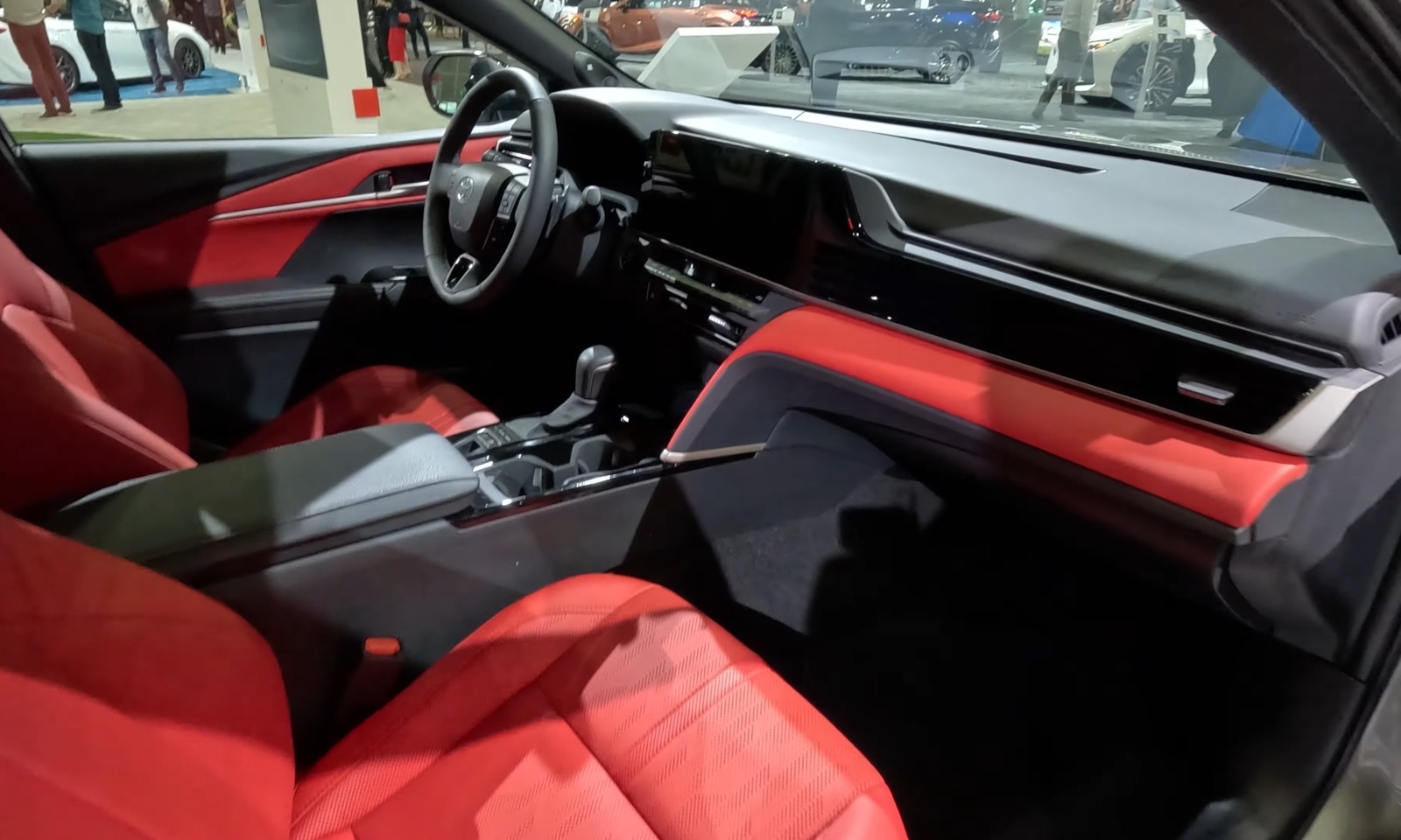 2027 Toyota Camry Hybrid XSE interior dashboard, real photograph.