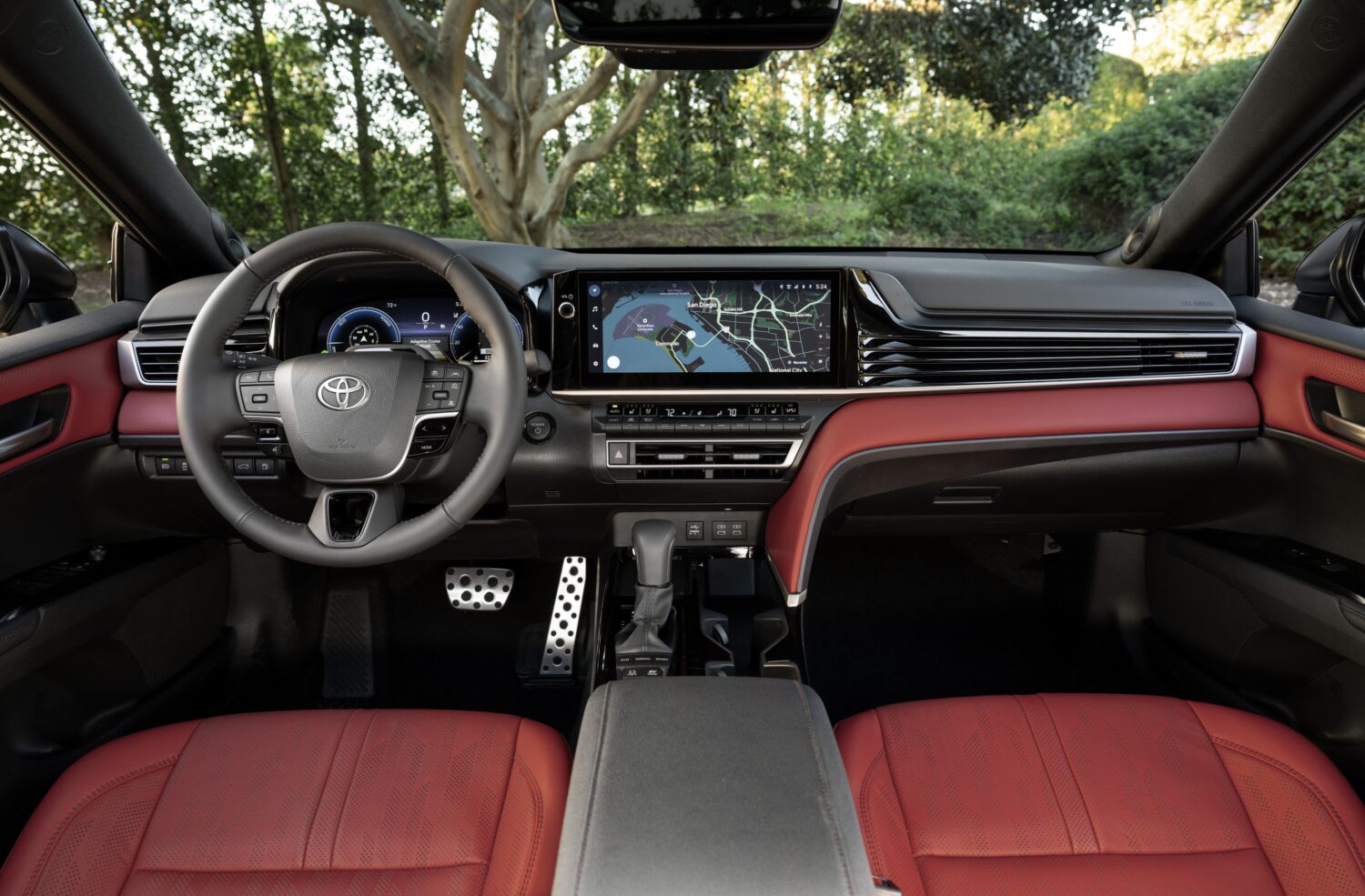 2027 Toyota Camry XSE interior with Cockpit Red leather, official Toyota press photograph.