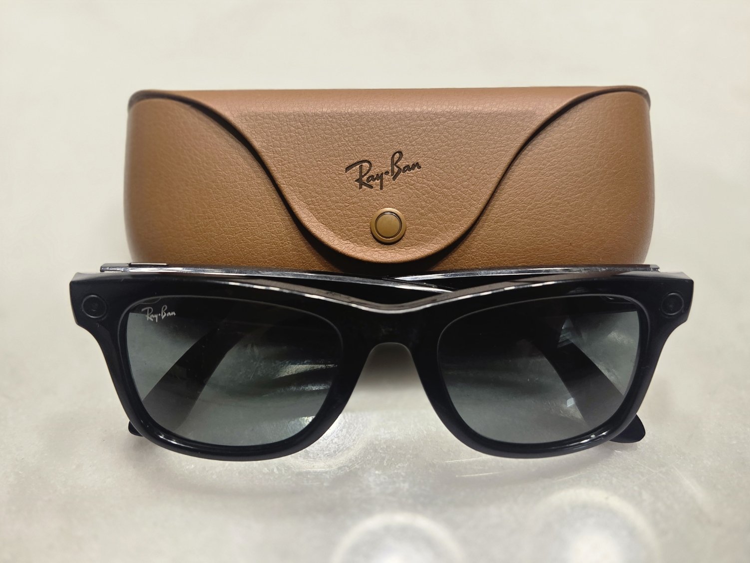 Ray-Ban Meta smart glasses with charging case.