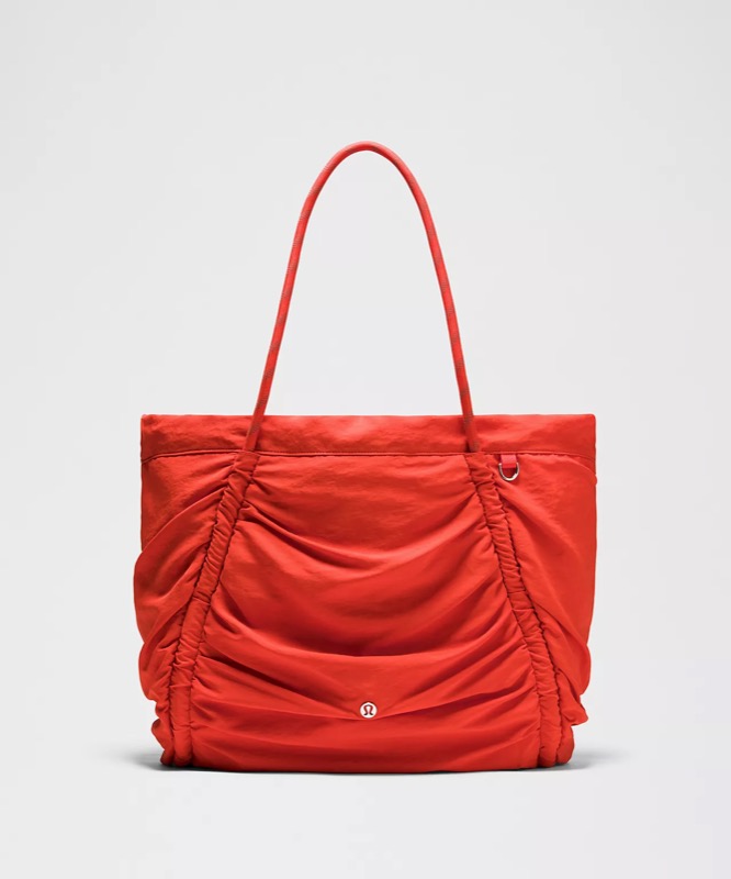 lululemon Ruched Tote Bag 24L in red, real product photo.