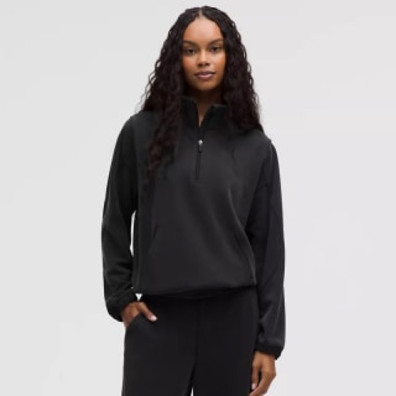 lululemon Softstreme Half-Zip pullover in black, real product photo.