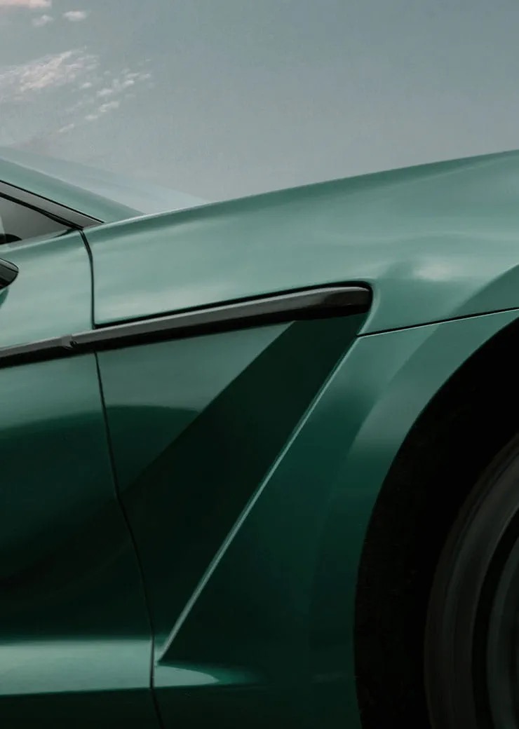 Close-up of the Aston Martin DBX707's front fender vent and wheel arch.