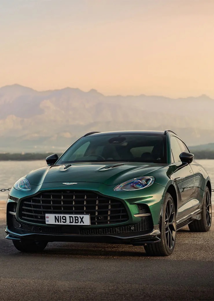 Front view of the Aston Martin DBX707, showing its grille and headlights.
