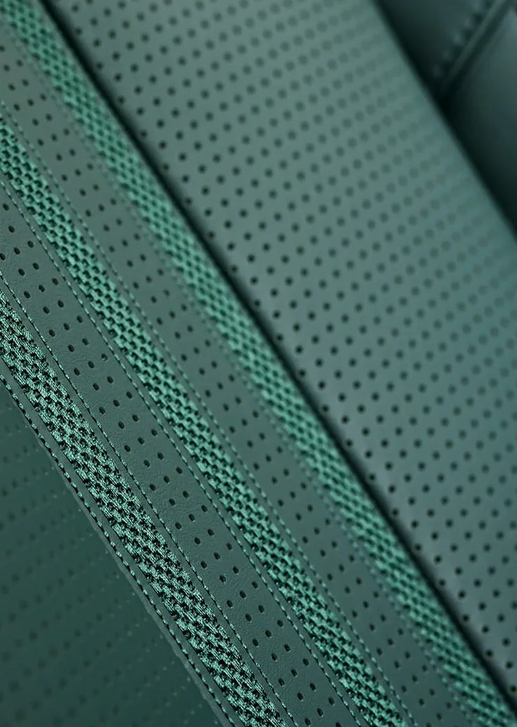 Close-up of the Aston Martin DBX707's perforated leather seat upholstery.
