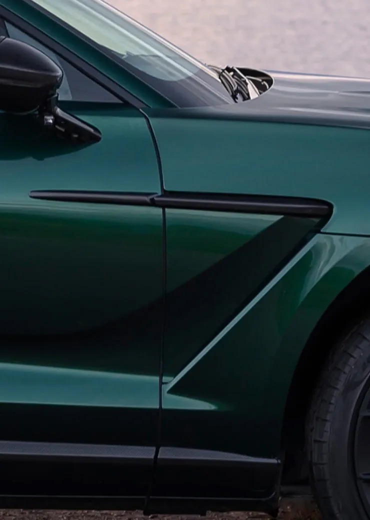 Detail of the Aston Martin DBX707's side sill and lower body panel.