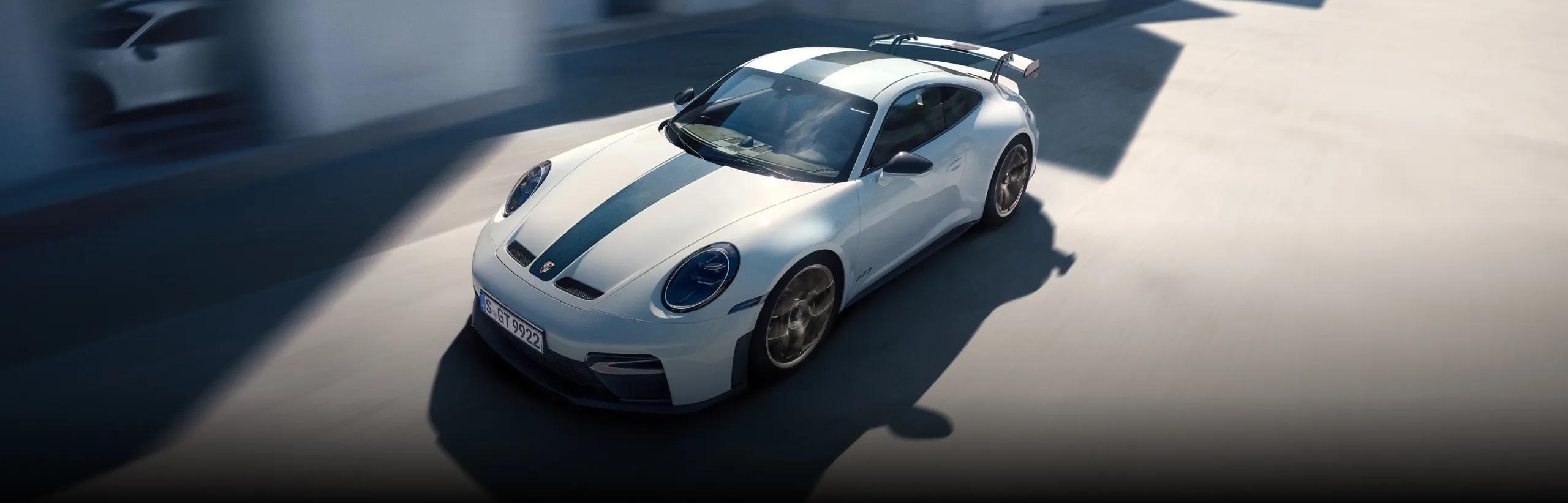 Porsche 911 GT3, driving shot on track.