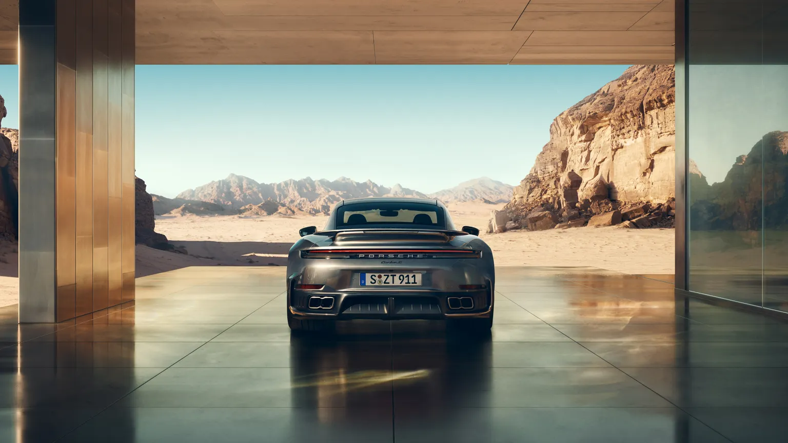 Porsche 911 Turbo S, rear three-quarter exterior shot.