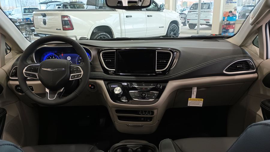 Pacifica dashboard with digital cluster and center screen (2022 car).