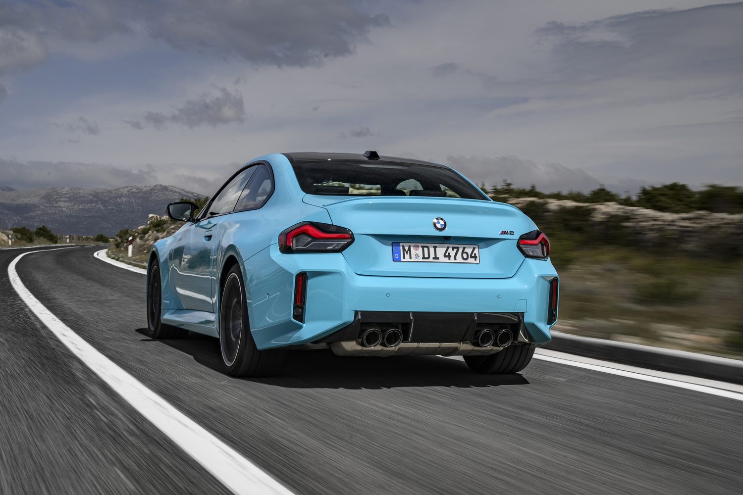 Rear view of the BMW M2 with M xDrive showing quad exhausts and ducktail bootlid.