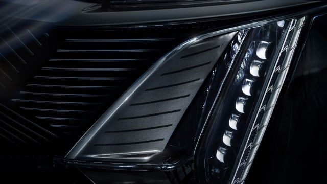 Close-up of the Cadillac Celestiq's headlight and grille detail.