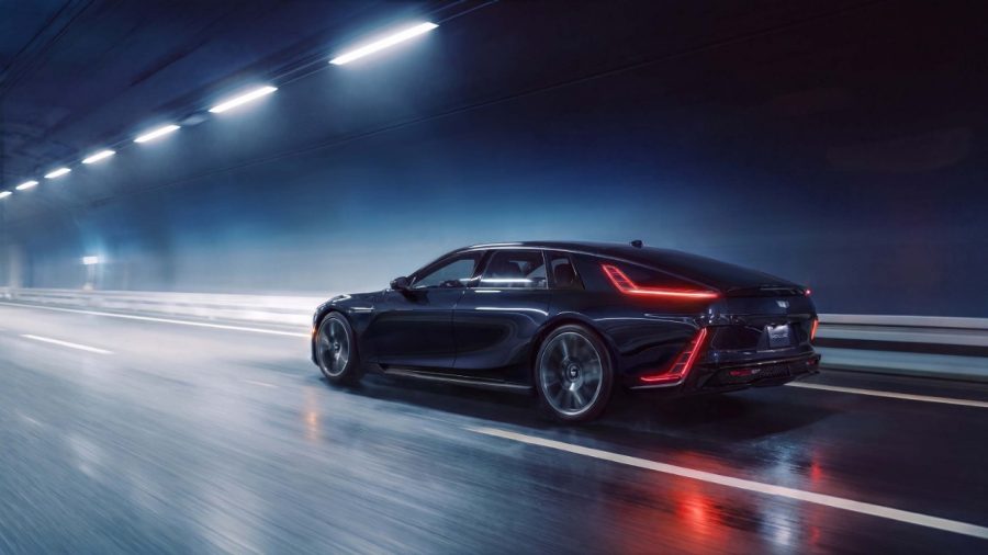 Cadillac Celestiq in dark blue, driving through a tunnel at night.