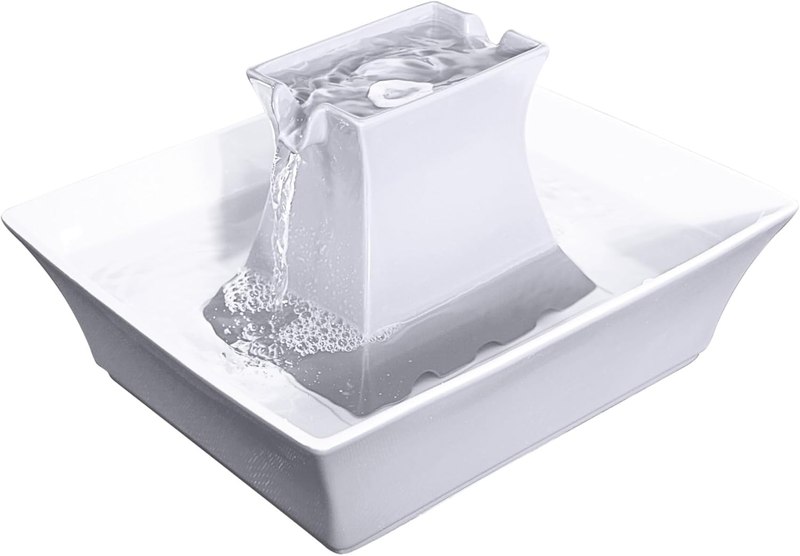 PetSafe Drinkwell Pagoda Fountain, Filters Included, 70 oz Ceramic, White | 2 Free-Falling Water Streams Encourage Hydration, Pet Water Fountain for Cats & Small Dogs, Replaceable Carbon & Foam Filters