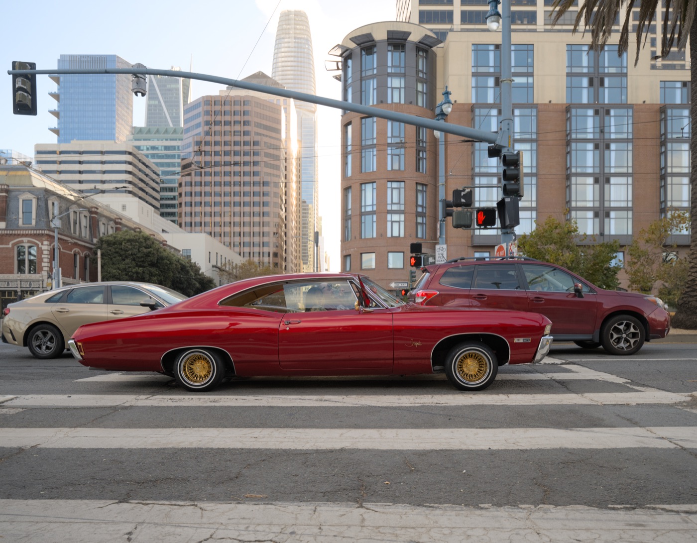 A Chevrolet Impala lowrider on the Embarcadero in San Francisco, real photograph.