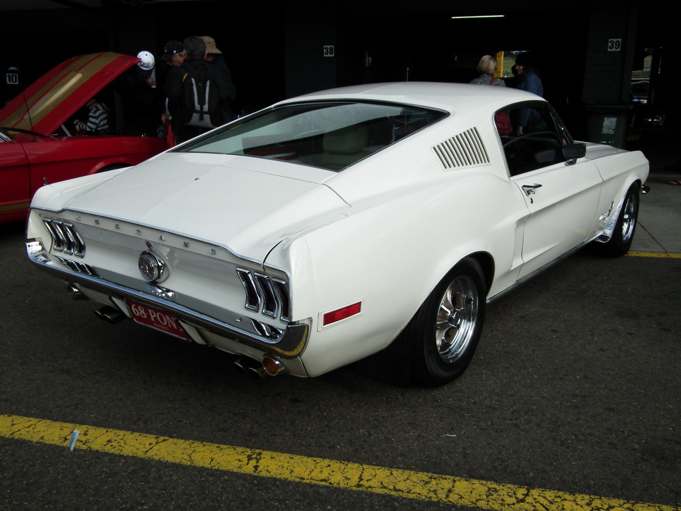 A 1968 Ford Mustang GT fastback, real photograph.