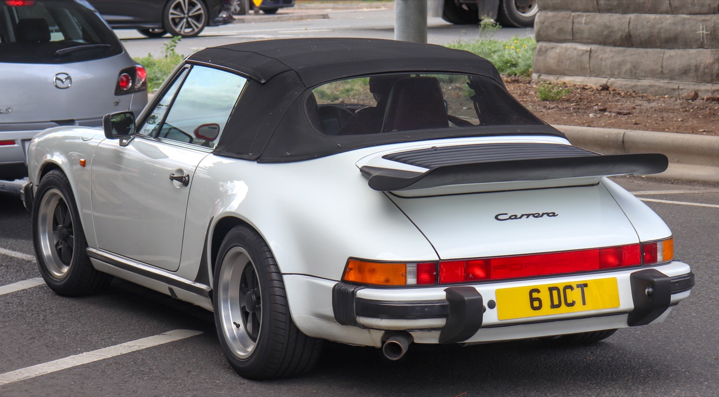 A 1987 Porsche 911 Carrera 3.2, real photograph.