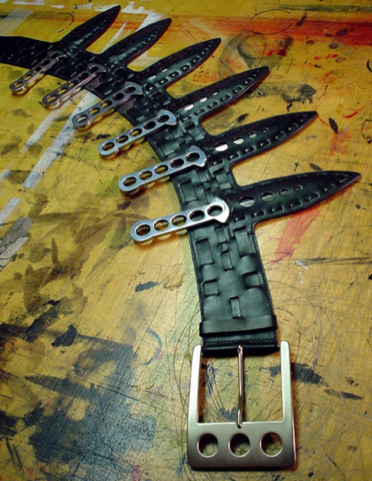 The black leather multi-knife belt worn by Halle Berry as Jinx in Die Another Day, from the Whitaker Malem costume archive