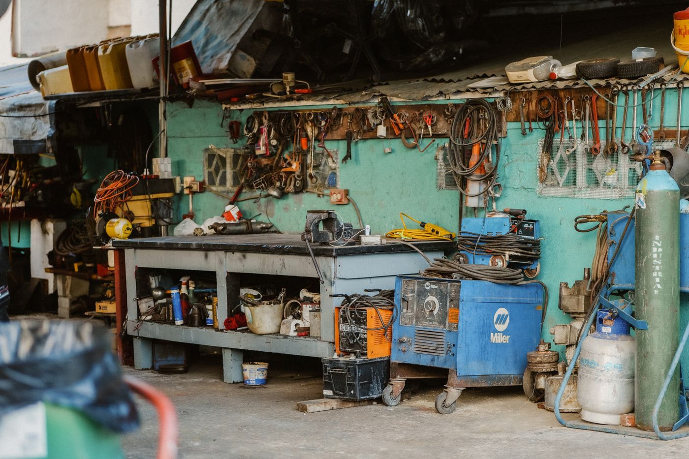 Tools hung and stored on a workshop wall