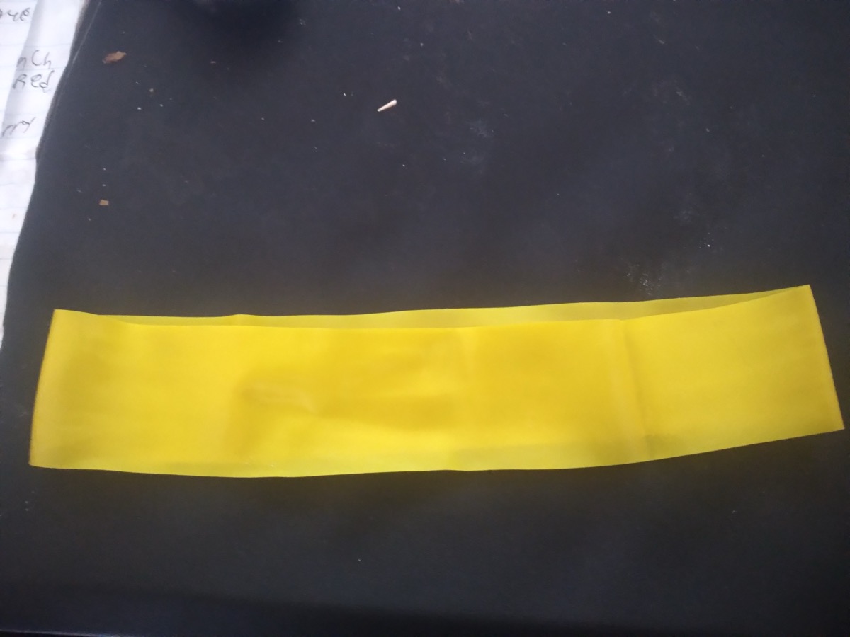 A yellow resistance band