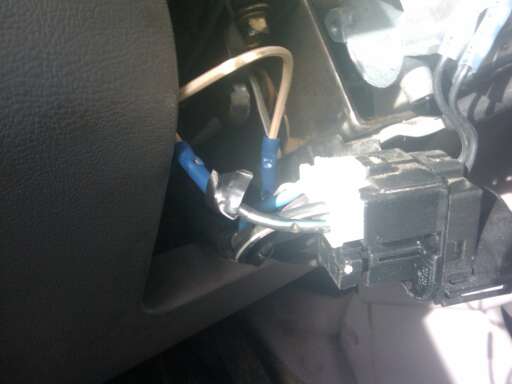 Wires cut and wired for a manual flip-switch ignition kill switch, real photograph.