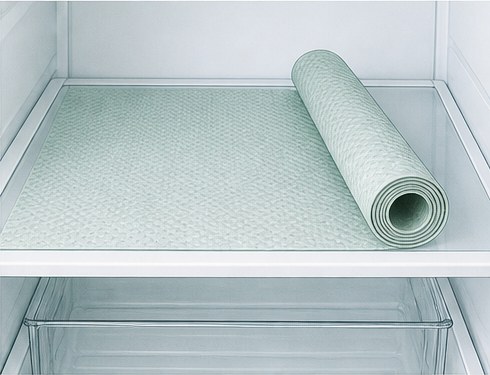 Drawing of a wiped shelf with a rolled washable liner mat.