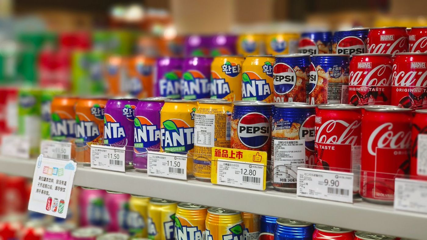 Shelf of products with price labels in a store