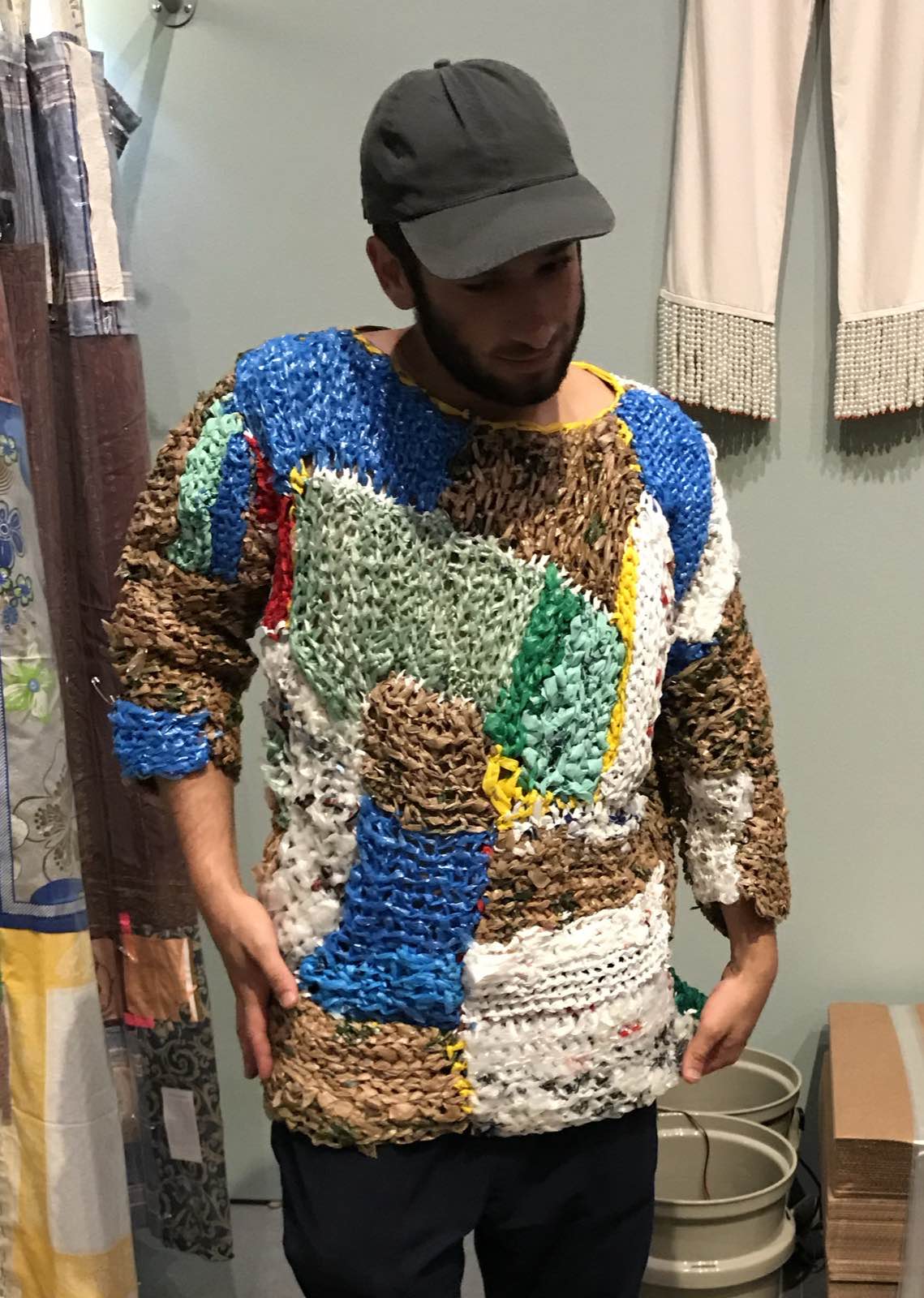 An Eckhaus Latta garment displayed on a mannequin, a real photograph.