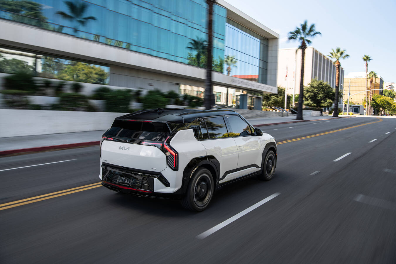 2027 Kia EV3, official Kia press photography, driving shot 3.