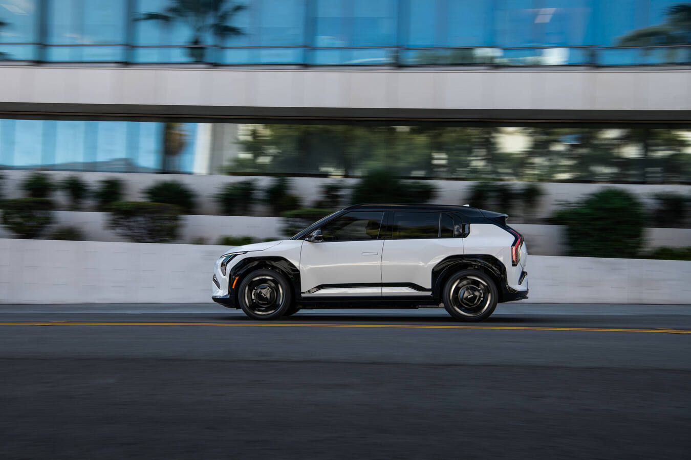 2027 Kia EV3, official Kia press photography, driving shot 4.