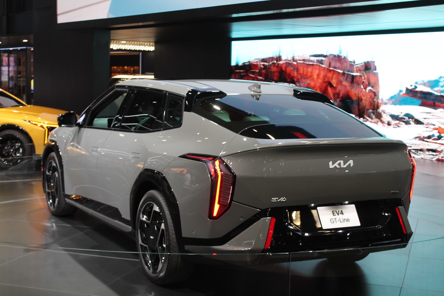 Rear three-quarter view of the 2026 Kia EV4.