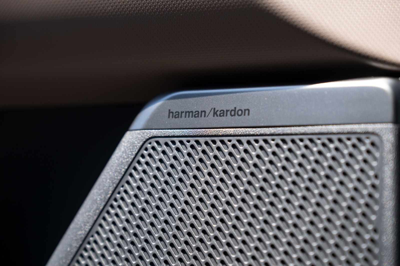 2027 Kia Seltos Harman Kardon speaker detail, official Kia press photography.