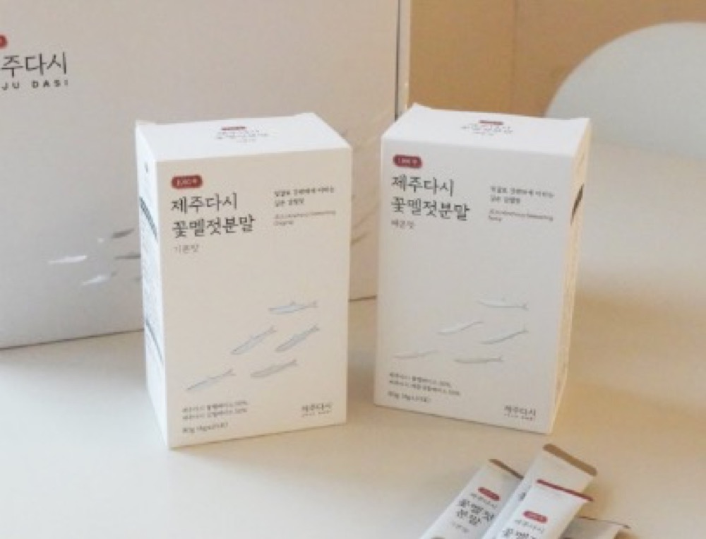 Jeju Dasi flower-anchovy jeotgal seasoning powder boxes, real product photo.