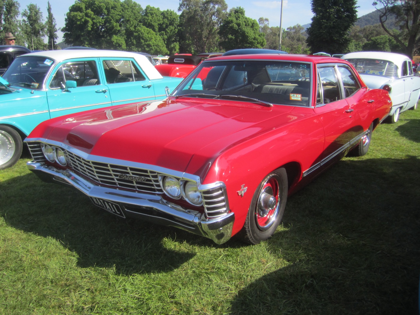 A 1967 Chevrolet Impala sedan, real photograph.