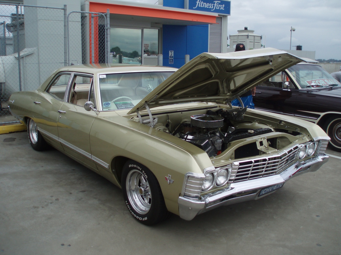 A 1967 Chevrolet Impala sedan, real photograph.